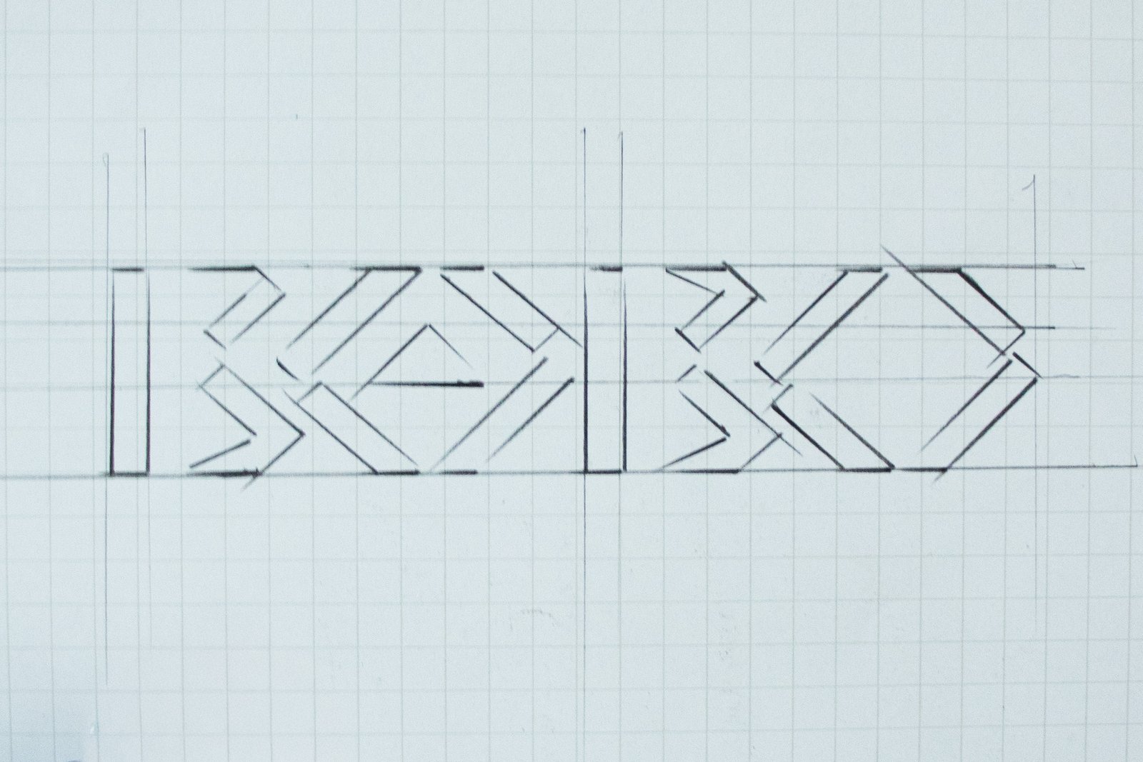 Early sketch exploration for the Bobo in the House Tongva wordmark, showing geometric construction and directional form.”