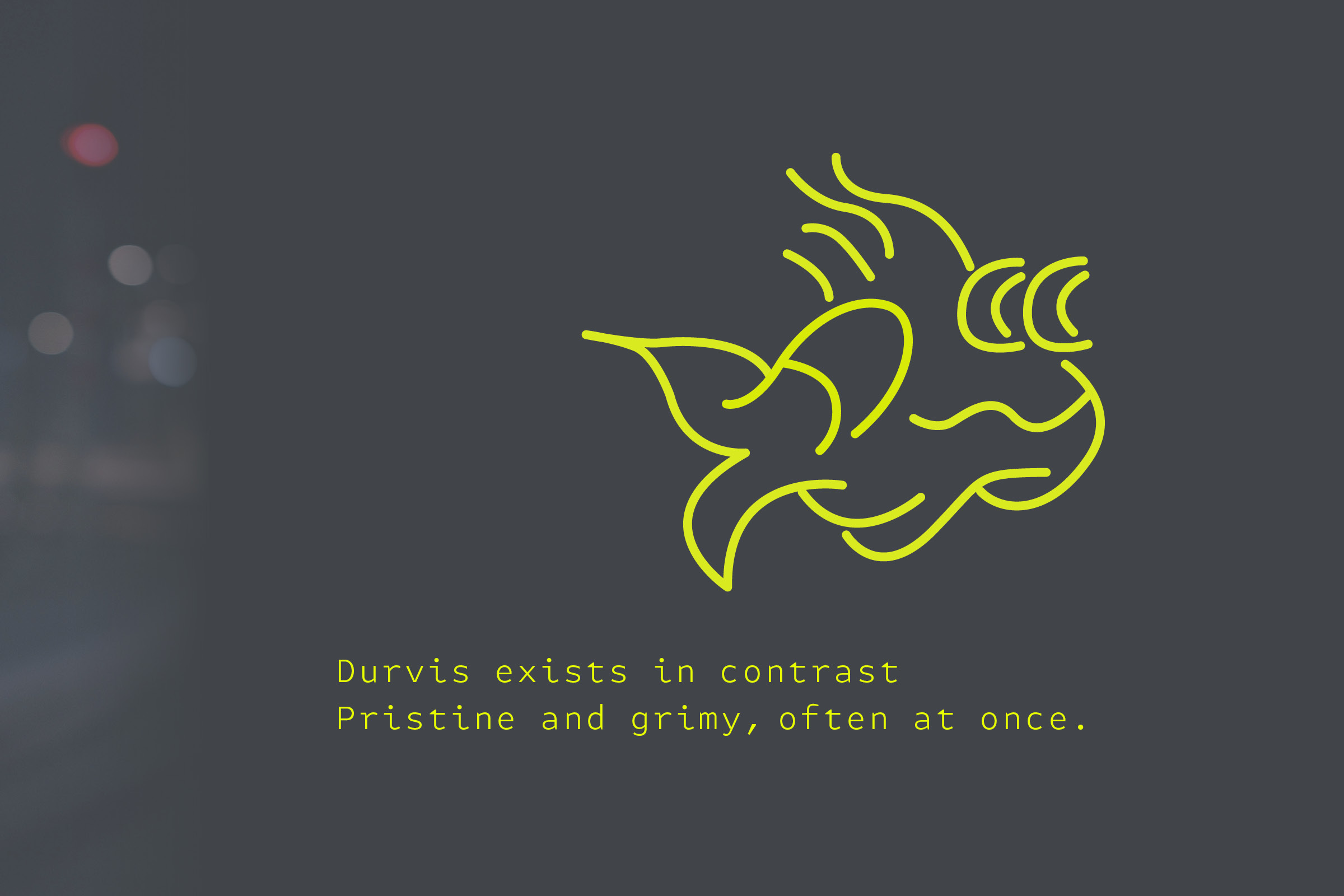Durvis logo in neon yellow on dark background with blurred urban light strip